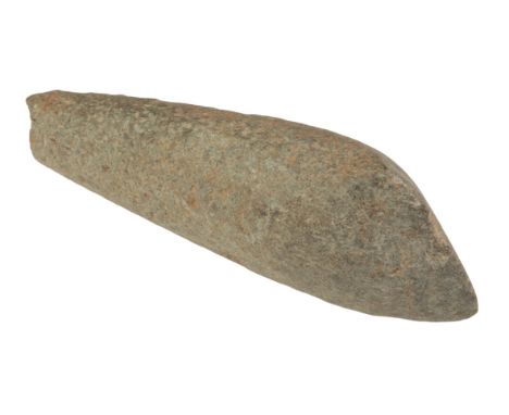 A NEOLITHIC STONE AXEHEAD c. 4000-2350 BC, of light grey-green stone and of sub-triangular shape with a lentoid cross section