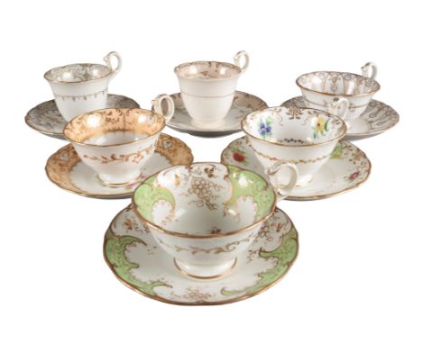 A GROUP OF SIX H & R DANIEL SUTHERLAND SHAPE CUPS AND SAUCERS including four teacups, in pattern 8072, pattern 8421, pattern 