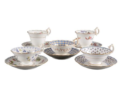 A SET OF FIVE H & R DANIEL SECOND BELL SHAPE CUPS AND SAUCERS including three teacups in pattern 6244, pattern 6249 and patte