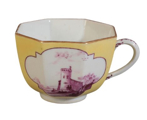 A MEISSEN PORCELAIN TEACUP mid 18th century, of yellow ground, decorated with architectural landscape scenes to the exterior 
