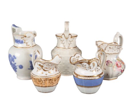 A GROUP OF FIVE H & R DANIEL TABLE JUGS of various shapes and patterns, including an Old English Shape jug, decorated with em