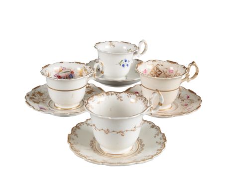 A GROUP OF FOUR H & R DANIEL SHREWSBURY SHAPE COFFEE CUPS AND SAUCERS including pattern number 4244, decorated with shells to