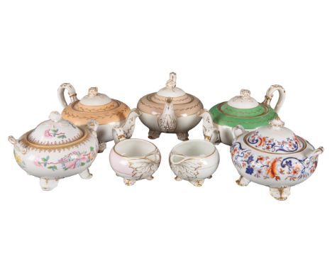 A COLLECTION OF H & R DANIEL SECOND GADROON SHAPE TEAWARES of the plain edge variety, including a teapot in pattern D069, a t