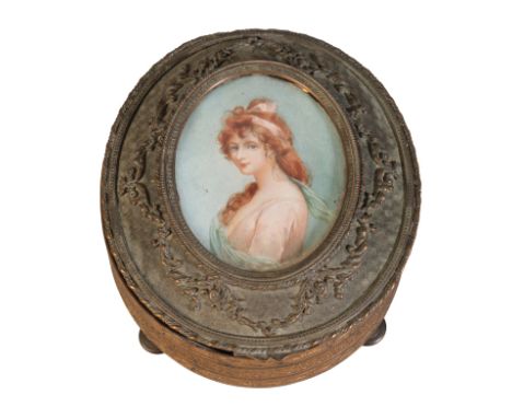 A FRENCH ORMOLU JEWELLERY BOX 19th century, of oval form, the lid inset with a portrait on ivory of Lady Langham after Joshua