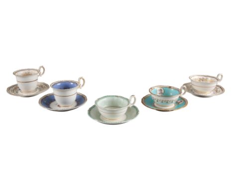 A GROUP OF FIVE H & R DANIEL SECOND GADROON SHAPE CUPS AND SAUCERS including teacups in pattern 5039 and 4179, and one with a