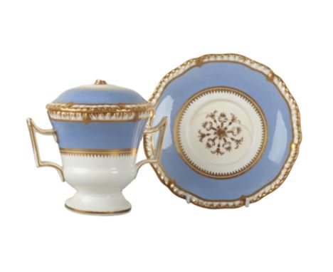 A RARE H & R DANIEL FIRST GADROON SHAPE CHOCOLATE CUP AND STAND decorated in pattern 3955, with lilac band and gilt highlight