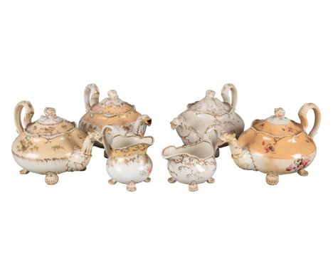 A GROUP OF FOUR H & R DANIEL SHELL 'B' SHAPE TEAPOTS including a teapot, 15cm high, together with a jug, in pattern 5574, a t