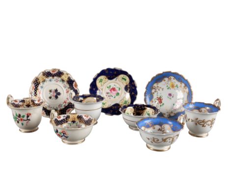 A GROUP OF THREE H & R DANIEL SHREWSBURY SHAPE TRIOS including pattern 4710, with blue and gilt borders and yellow panels of 