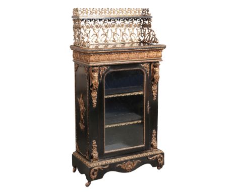 A NAPOLEON III EBONISED AND PARCEL GILT PIER CABINETlate 19th century, with elaborate ormolu pierced gallery atop, a glazed d