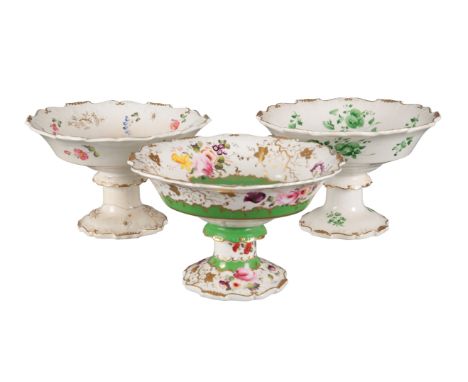 A GROUP OF THREE H & R DANIEL SHREWSBURY SHAPE CENTREPIECES including one in pattern 4397, the white ground decorated with co