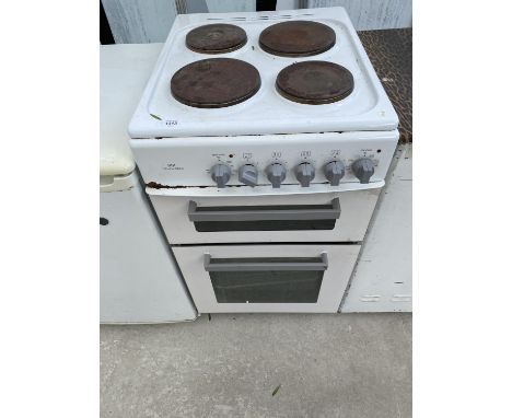 A NEW WORLD COOKER WITH FOUR RING HOB,DOUBLE OVEN AND GRILL - NO PLUG ATTACHED, NOT TESTED. 