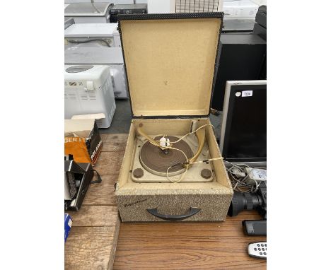 A CASED VINTAGE RECORD PLAYER 
