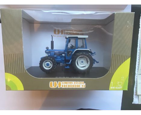 A UNIVERSAL HOBBIES FORD 7810 TRACTOR 1:32 SCALE NUMBER VH2865 - IN MINT CONDITION AND BOXED 