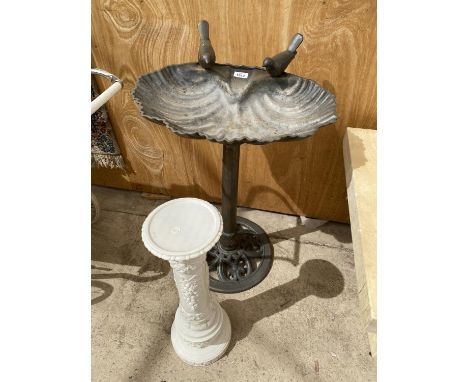 A PLASTIC BIRD BATH AND A CERAMIC PLANT STAND COLUMN 