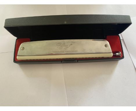 A ROLING'S CHROMATIC HARMONICA IN BOX 