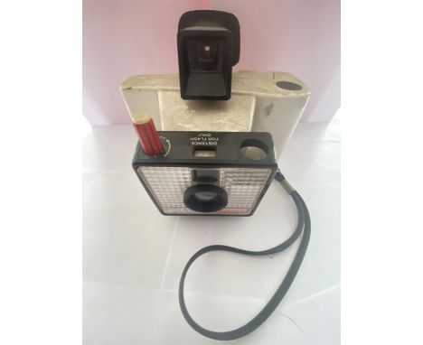 A VINTAGE POLAROID CAMERA 