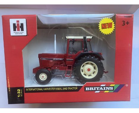 A BRITAINS INTERNATIONAL HARVESTER 956XL TRACTOR 1:32 SCALE NUMBER 42792 - IN MINT CONDITION AND BOXED 