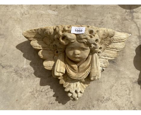 A CHERUB WALL PLANTER 