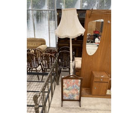 A TAPESTRY FIRESCREEN AND A WHITE STANDARD LAMP 