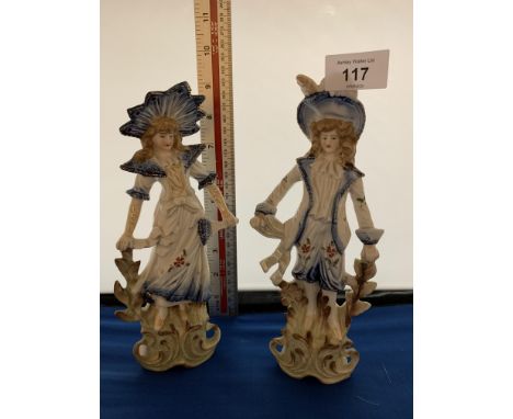 A PAIR OF CERAMIC LADY AND GENT FIGURINES 