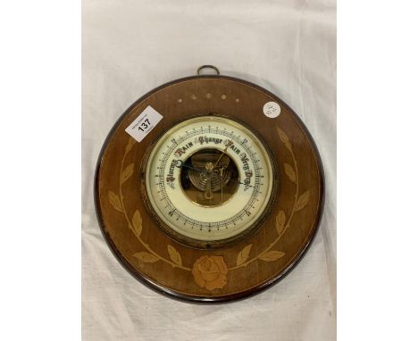 A CIRCULAR INLAID BAROMETER 