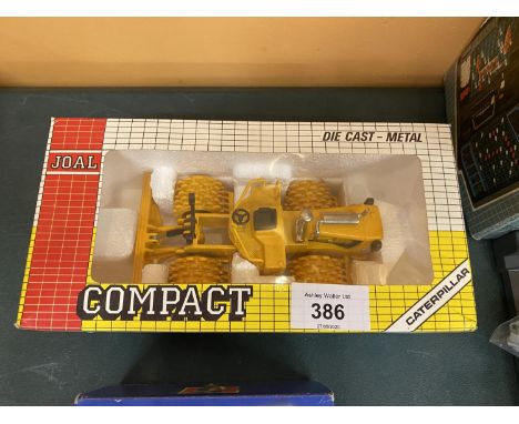 A BOXED JOAL COMPACT CATERPILLAR COMPACTOR CAT 825B 