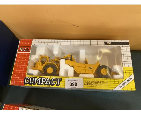 A BOXED JOAL COMPACT WHEEL TRACTOR SCRAPER 631D 