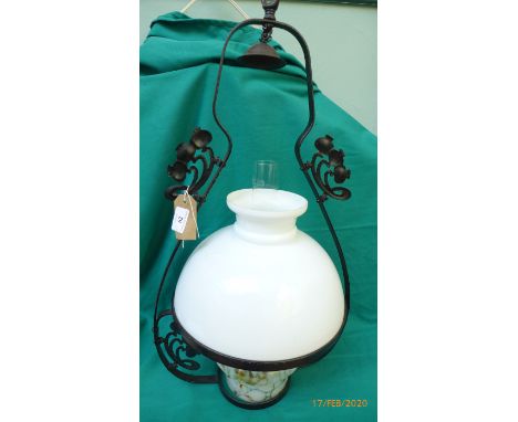 Metal framed hanging oil lamp with clouded glass shade and yellow and white mottled bowl