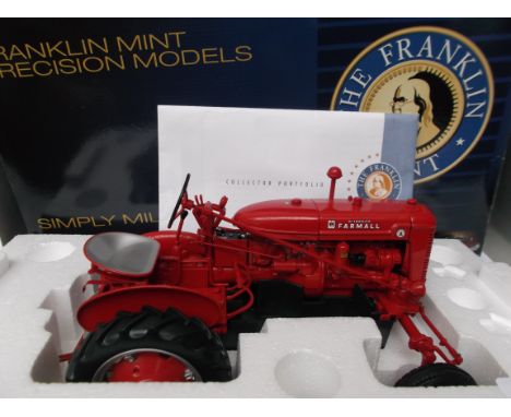 Franklin Mint precision model of a McCormick Farmall Tractor (Guide Price £50-£60)FLY FISHERMANS CORNER