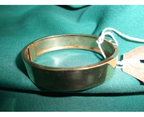 Yellow metal bangle (marked 9k)
