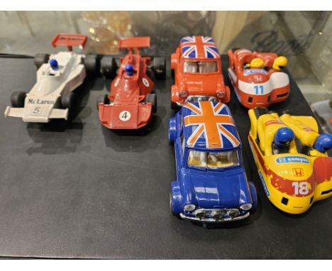 Four Scalextric cars and two motorcycles. UK P&amp;P Group 2 (£20+VAT for the first lot and £4+VAT for subsequent lots) 