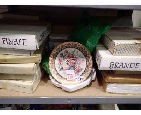 Shelf of mixed plates including Wedgwood. Not available for in-house P&amp;P 