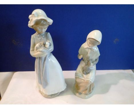 Two Nao figurines, girl with puppy and bunny. UK P&amp;P Group 2 (£20+VAT for the first lot and £4+VAT for subsequent lots) 