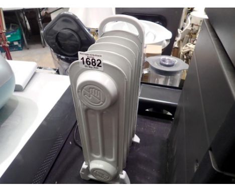 Warmlite model WL43002Y, oil filled radiator. Not available for in-house P&amp;P 