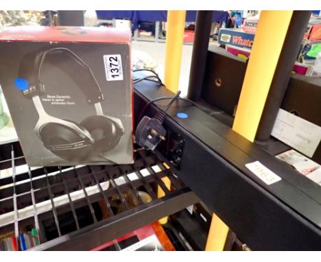 Roth 65 watt speaker and a pair of headphones. Not available for in-house P&amp;P 