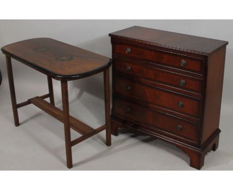 A modern mahogany finish chest, of four long drawers with ring back handles on stylized bracket feet, 79cm high, 73cm wide, 3