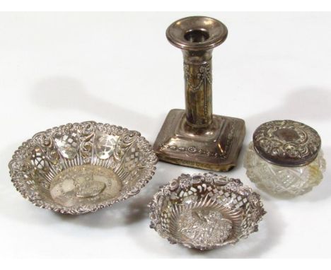 Various silver, comprising an Edwardian candlestick with trumpet shaped top, cylindrical stem and square bases with rounded c