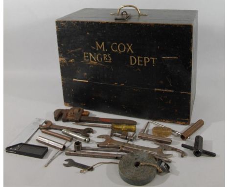 A late 19thC ebonised tool chest, of rectangular outline with fixed handle stamped M. Cox Engrs department, 43cm high, 53cm w