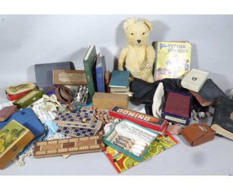 Various bygone toys, collectables, children's games, etc., to include an early to mid 20thC blond plush jointed Teddy bear wi