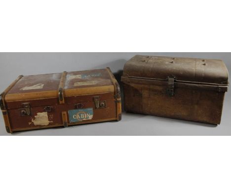 An early 20thC pressed leather and wooden bound travel case, with a quantity of various cabin labels to include RAF Cabin, et