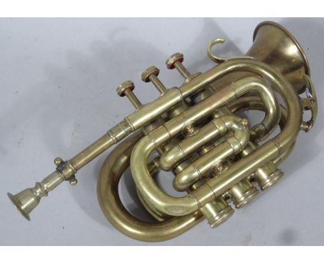 A mid 20thC cornet, with three articulated knops, unmarked, 30cm wide.