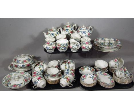 A Royal Doulton Booths Floradora pattern part service, to include lidded tureen 23cm wide, stand, coffee pot, teapot, serving