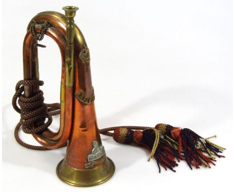 An early 20thC copper and brass Lincoln related bugle, of typical outline, partially strung with brass mouth piece, set with 