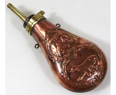 A 20thC copper and brass powder flask, with articulated top, the tear drop body raised with dog and birds, each in a shaped f