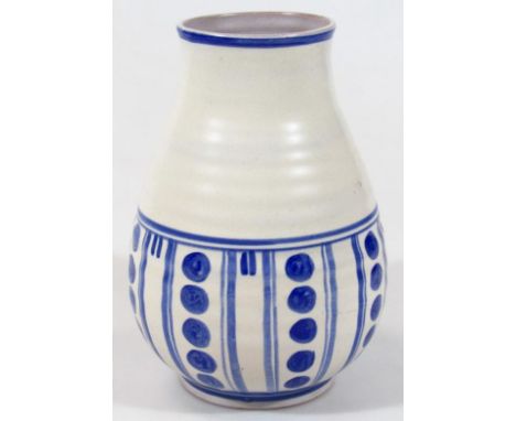 A very early 20thC Carter Stabler & Adams Poole pottery studio vase, of ribbed bulbous form with a blue line and dot decorati