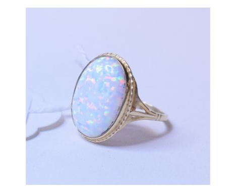 A 9ct gold and Gilson opal ring, approx. ring size O½ Condition report Modern