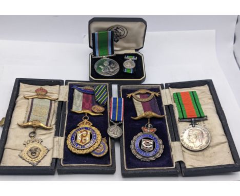 A collection of mixed medals and miniatures to include a WWII Defence Medal, 1960 National Service Miniature Medal and 2008 T