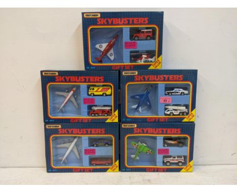 Five Matchbox Skybusters gift sets to include an RAF fighter jet with a Land Rover and a Sheriffs helicopter, a US Air Force 