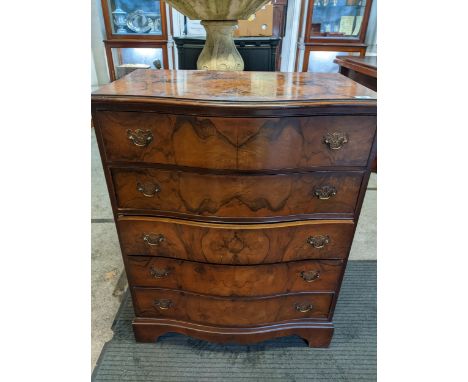 A Cameo furniture walnut Serpentine frosted chest of five drawers, brass swan neck handles, bracket feet 99x78x50cmsLocation: