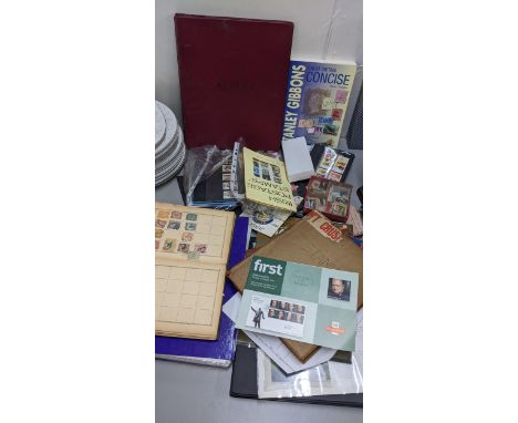 A selection of First Day covers and stamps from around the world, in albums and loose Location: ROS 